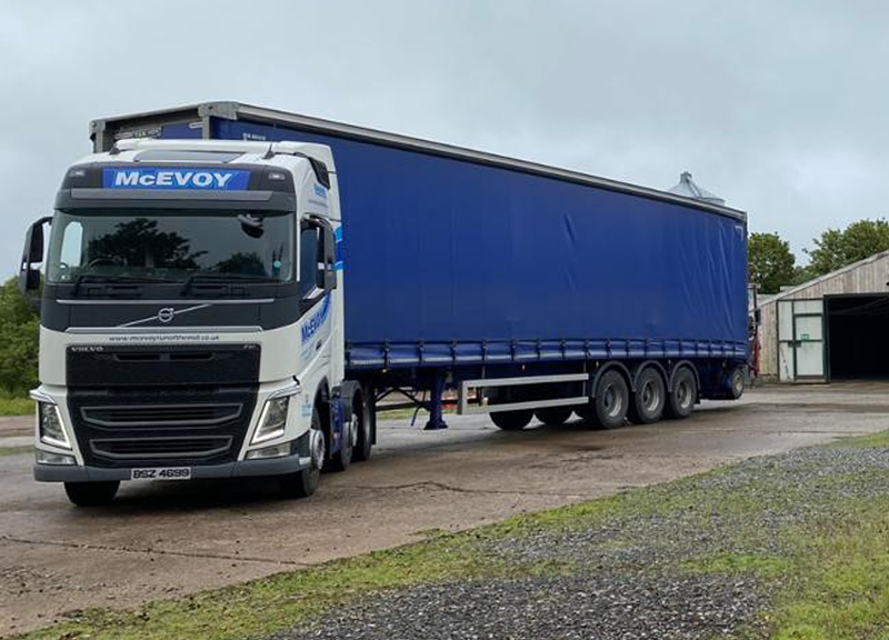 Truck with McEvoy branding on a road